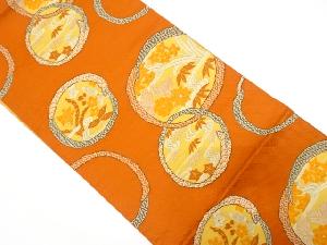 丸紋に流水・草花模様織り出し　名古屋帯